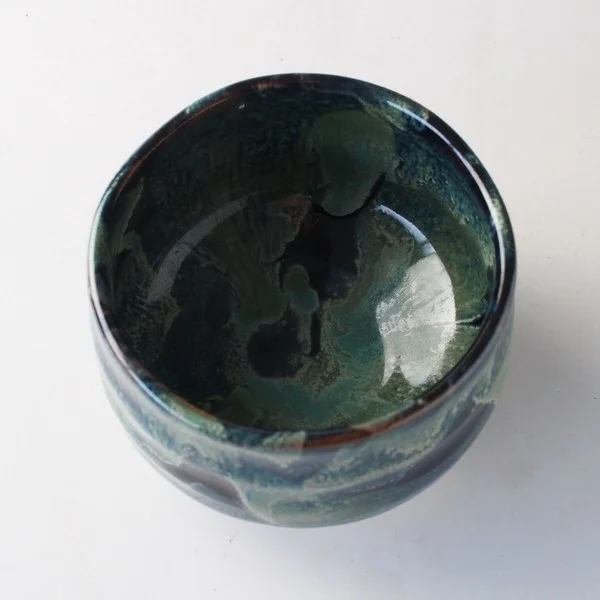 matcha tea bowl dark night top view