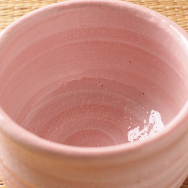 pink matcha tea bowl top view close up