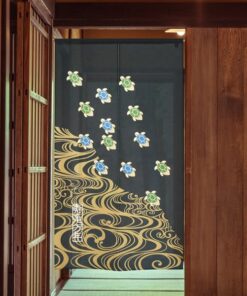 Japanese Noren Black and Gold Jukame Mannen - Made In Japan from inside of a room hangin on a door