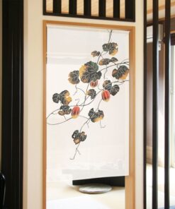 Japanese Noren Green Leaves Crow's Ear Pattern - Made In Japan hanging on a wall in an outdoor setting