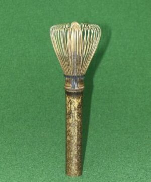 Muddler DE Tea is a black bamboo tea whisk-shaped stirrer